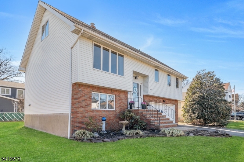 front view of house with a yard