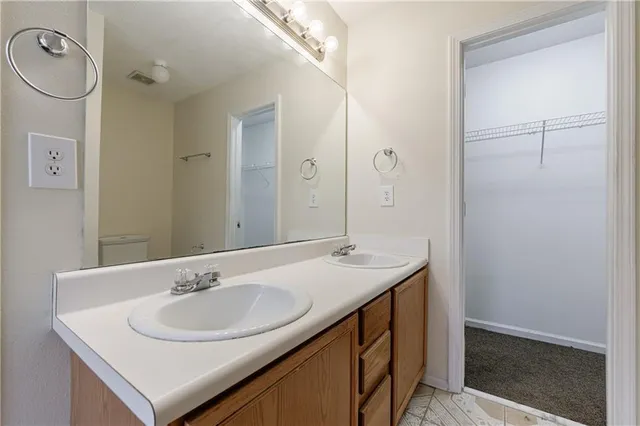 a white bath tub sitting in a bathroom