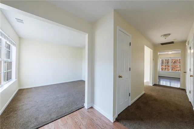 a view of livingroom with furniture and fireplace