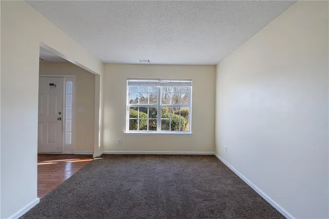 an empty room with windows