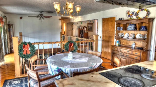 a bedroom with a bed and a book shelf