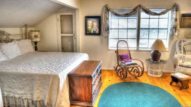 a bathroom with sink toilet and mirror