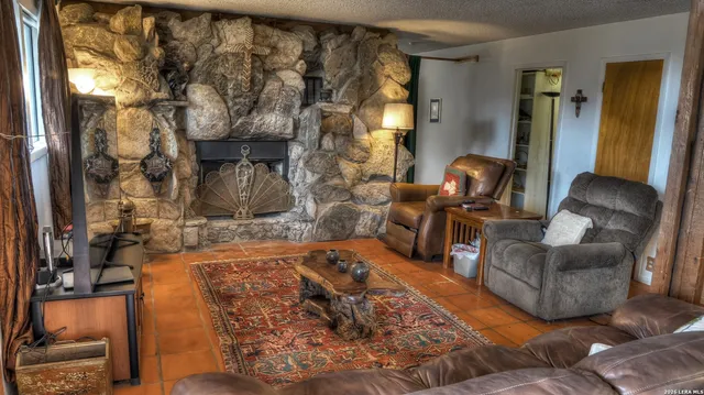 a view of a house with a tree