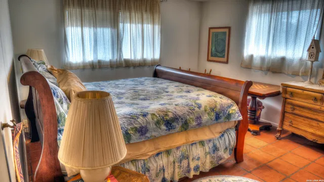 a picture of a book and a bed