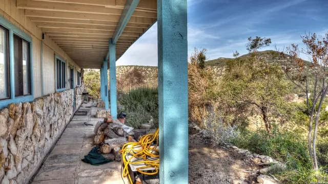 a view of swimming pool from stairs