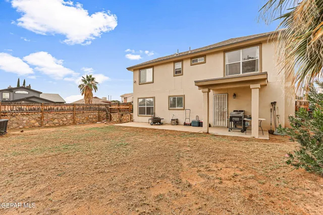 a view of a house with a patio
