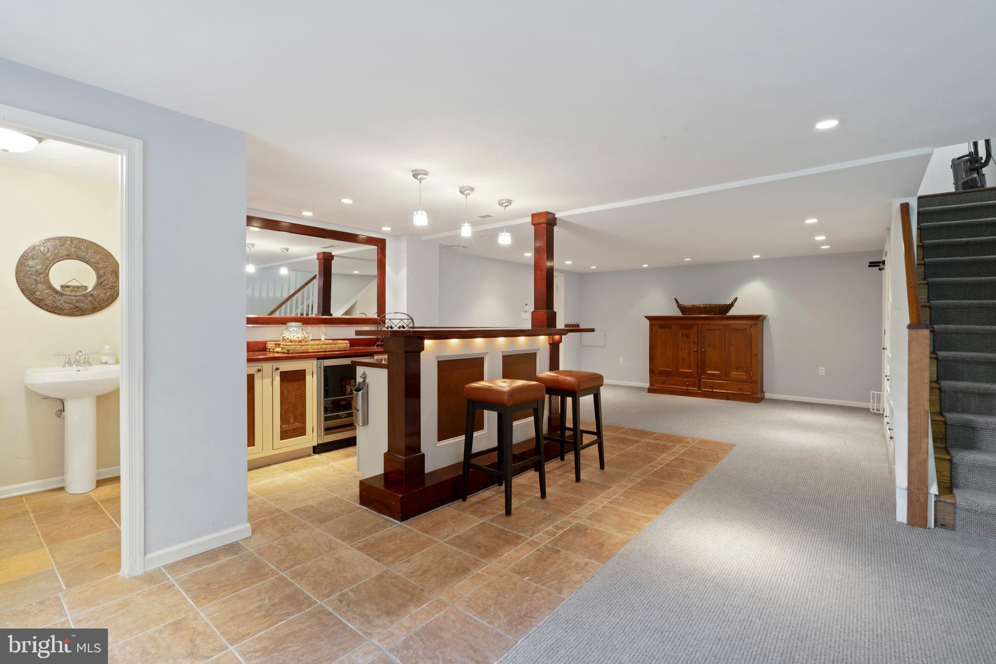 967 Ethan Allen Road Berwyn, PA 19312 - Photo 51 of 59 Basement Bar w Powder Room in view