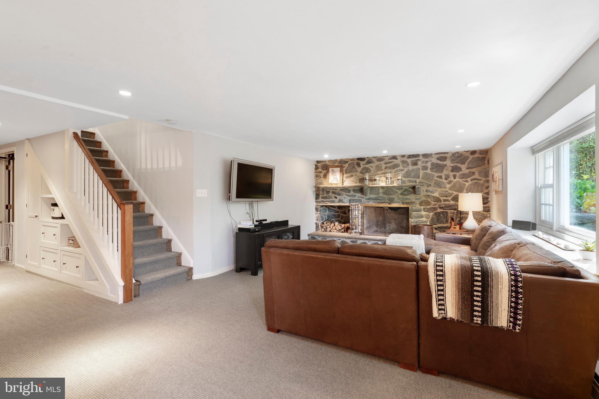 967 Ethan Allen Road Berwyn, PA 19312 - Photo 52 of 59 Finished Daylight Basement with Stone Fireplace