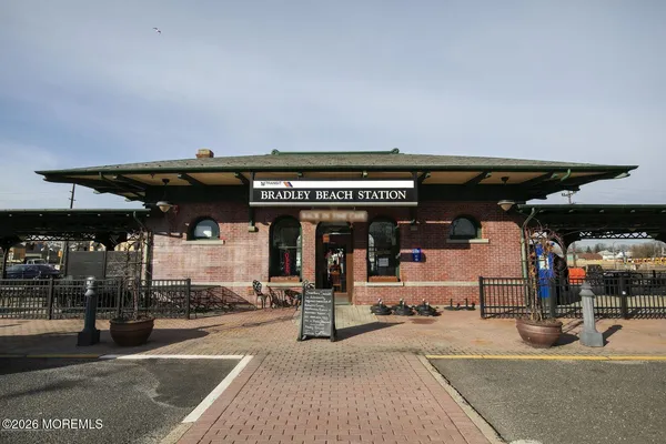 a view of a building with sitting area