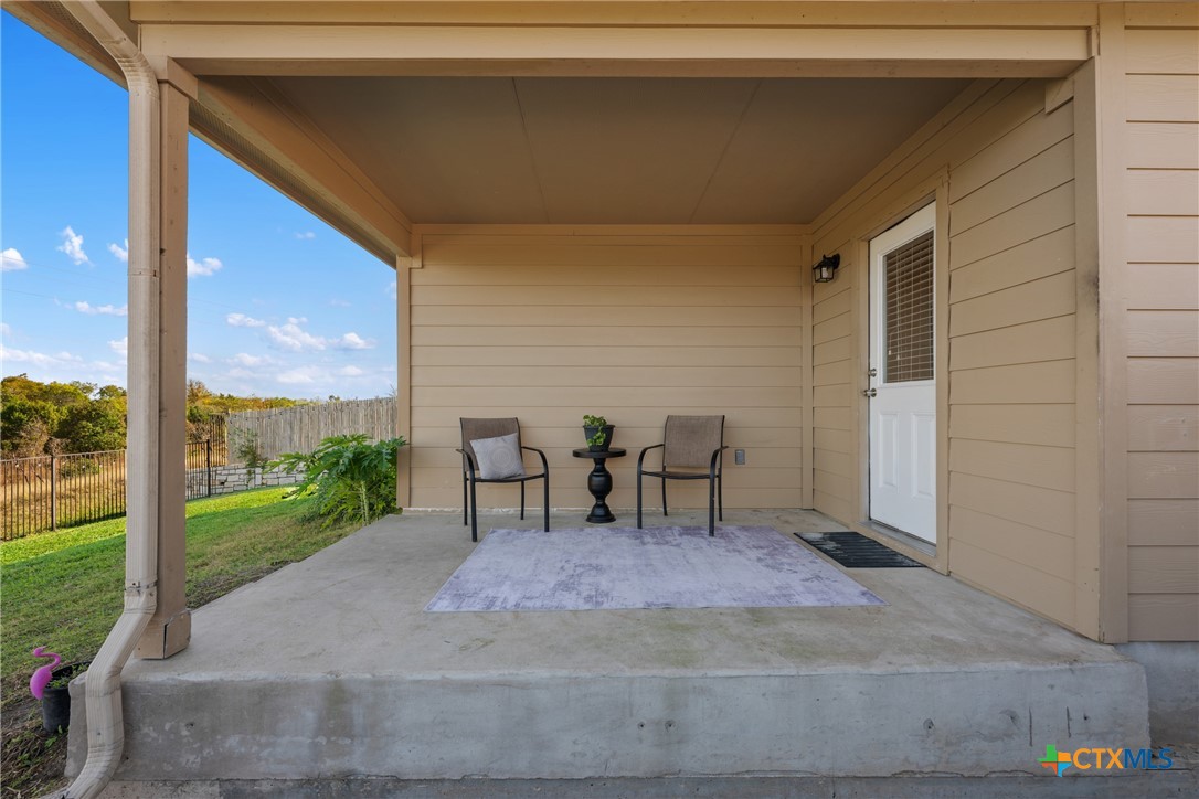 117 Liard River Road Hutto, TX 78634 - Photo 37 of 48 a view of two chairs in the patio