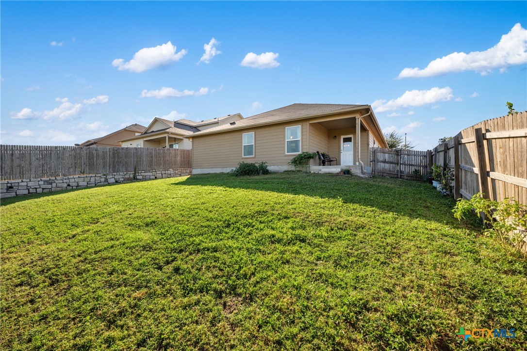 117 Liard River Road Hutto, TX 78634 - Photo 41 of 48 a front view of a house with a yard