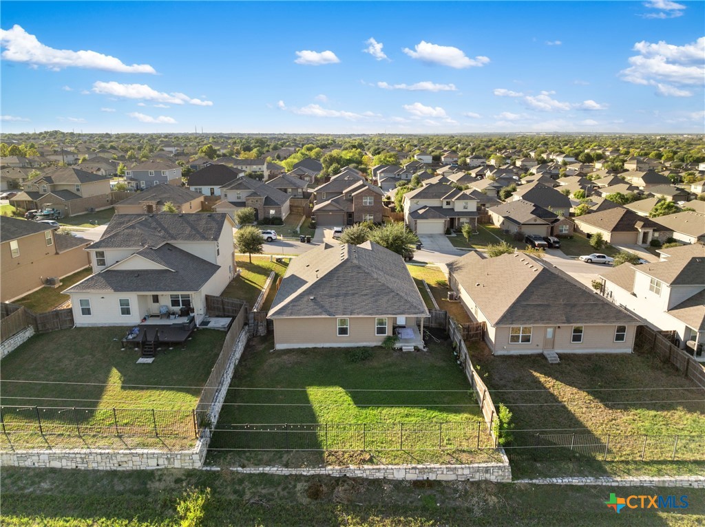 117 Liard River Road Hutto, TX 78634 - Photo 46 of 48 an aerial view of a house with a ocean view