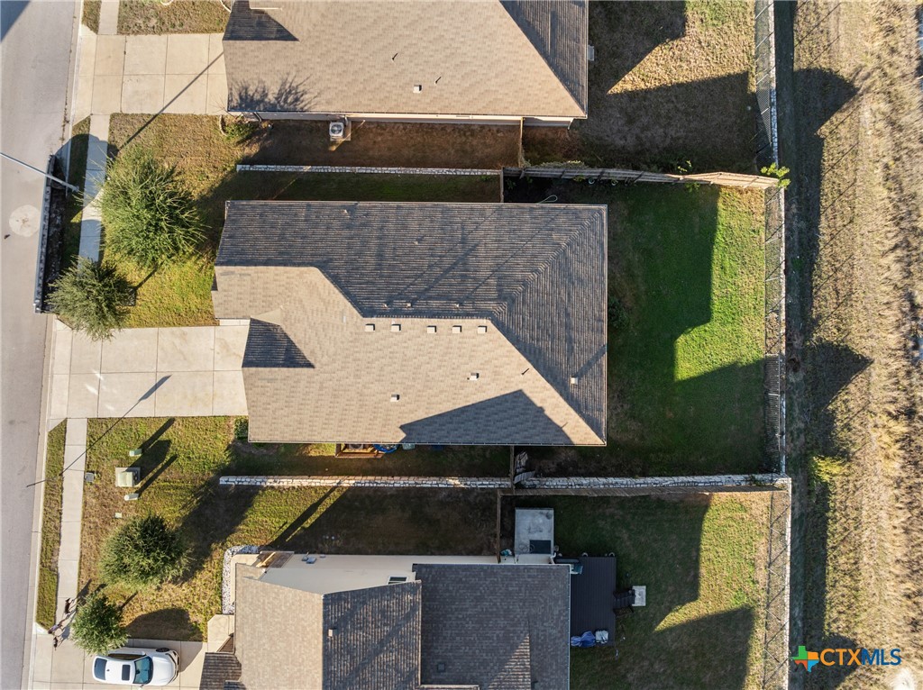117 Liard River Road Hutto, TX 78634 - Photo 48 of 48 an aerial view of houses with yard