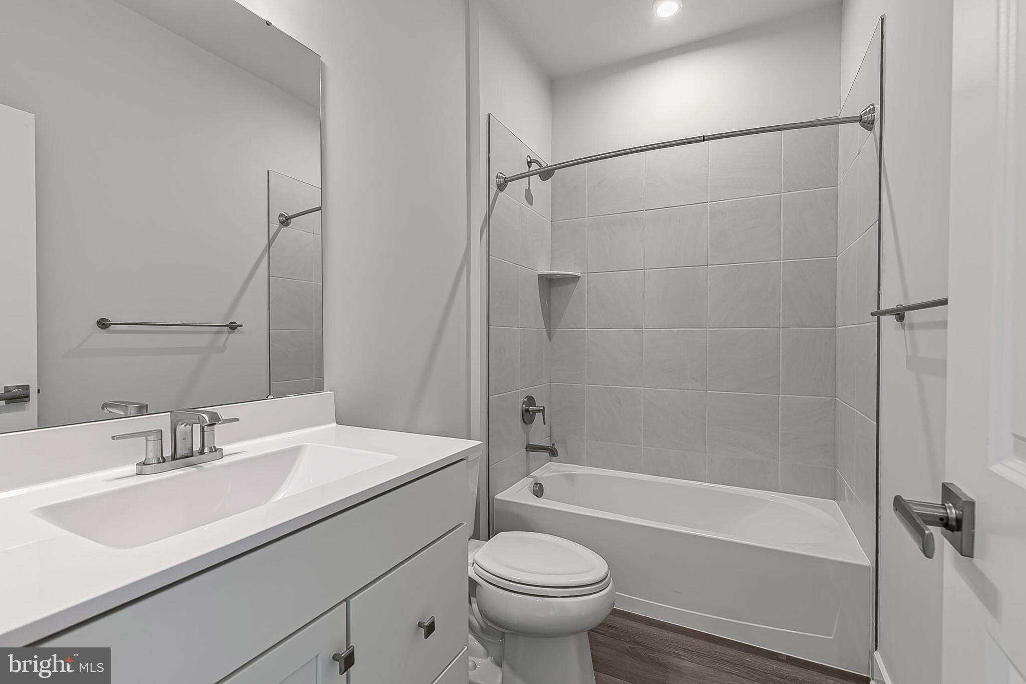 60 B Oasis Avenue Ranson, WV 25438 - Photo 28 of 38 a bathroom with a sink toilet and shower