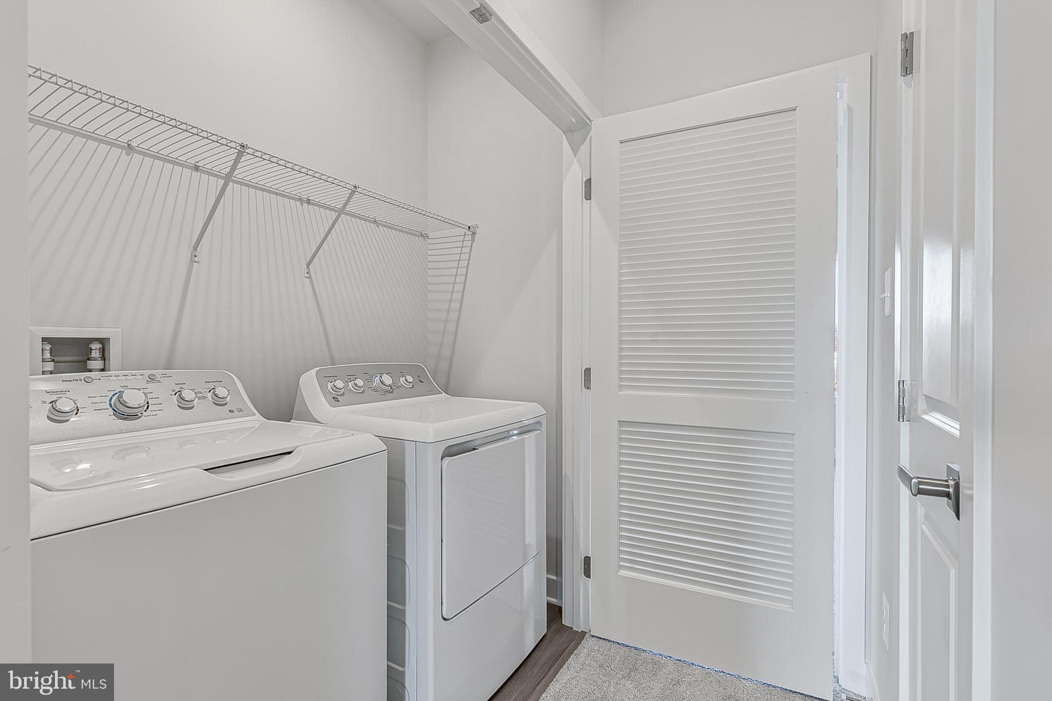 60 B Oasis Avenue Ranson, WV 25438 - Photo 37 of 38 a utility room with dryer and washer