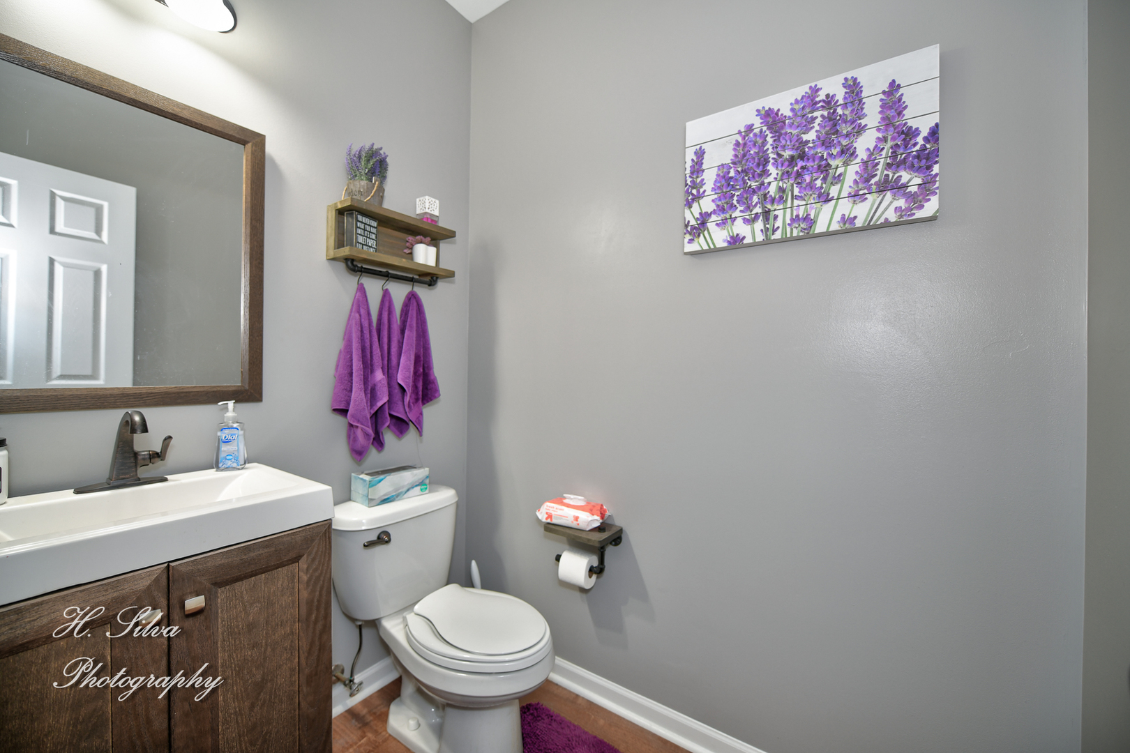 249 Sonora Drive Elgin, IL 60124 - Photo 15 of 42 a bathroom with a toilet sink and mirror