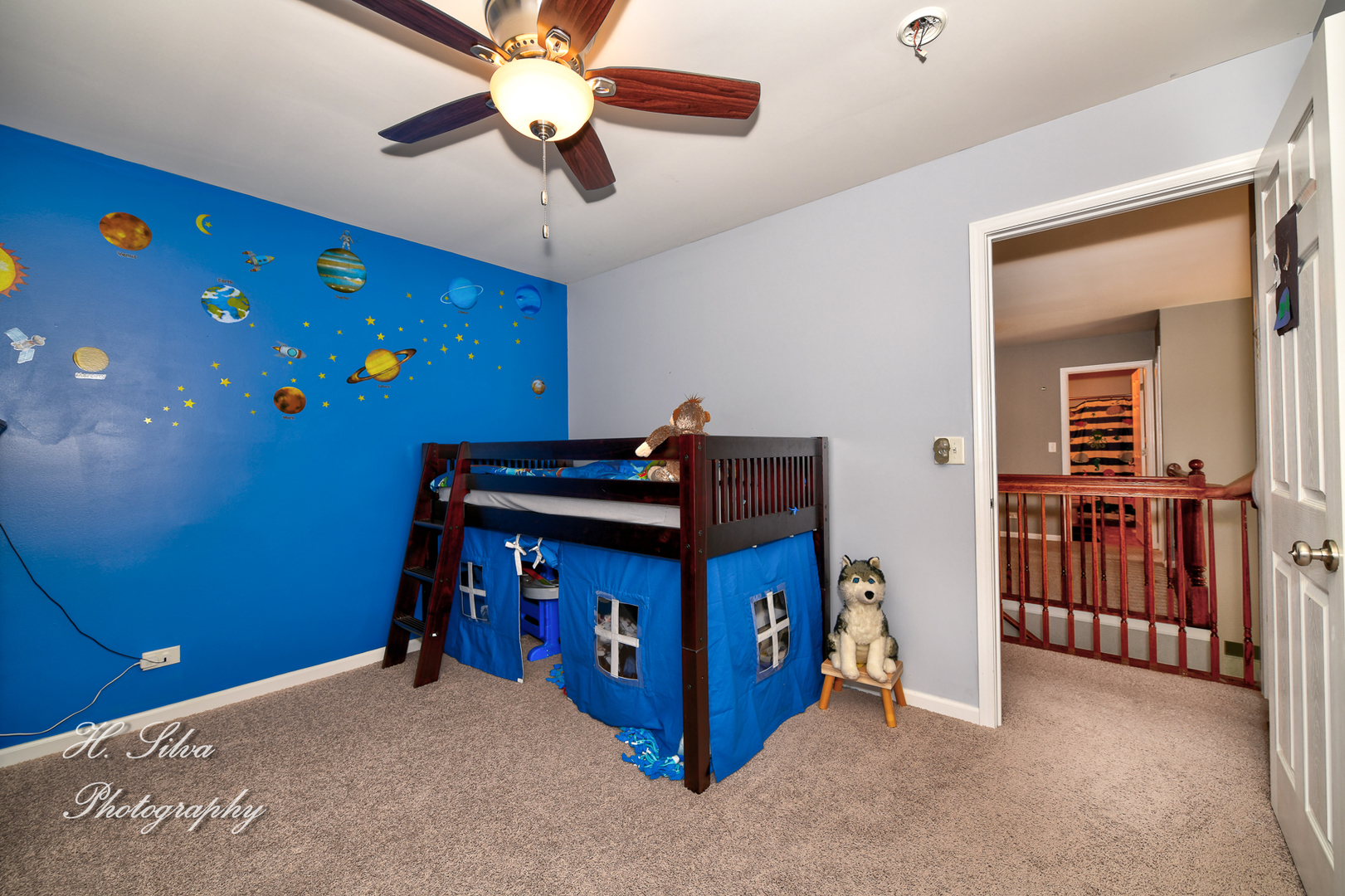 249 Sonora Drive Elgin, IL 60124 - Photo 27 of 42 a bedroom with a bed and a chandelier