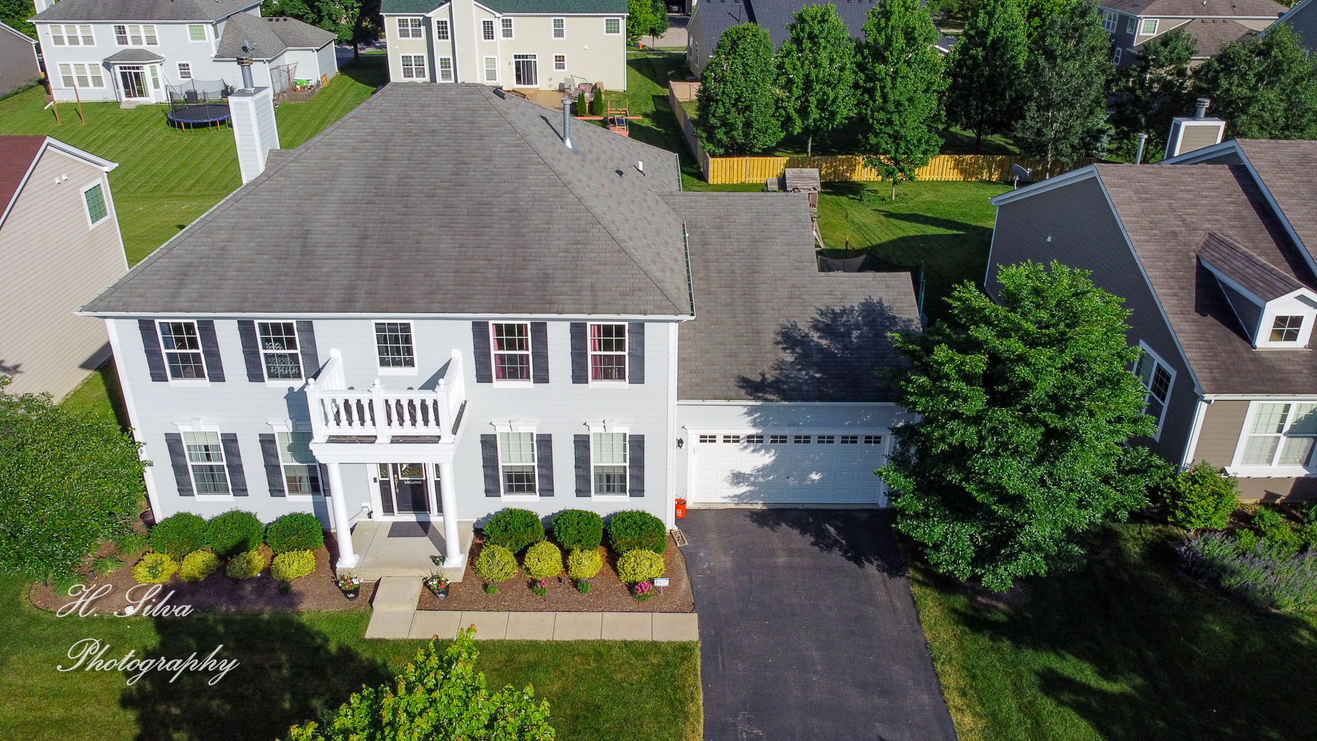 249 Sonora Drive Elgin, IL 60124 - Photo 38 of 42 an aerial view of a house with a garden and patio
