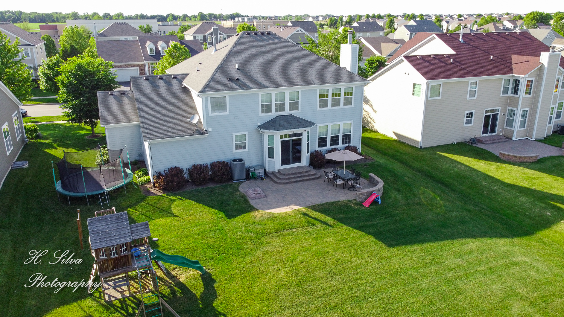 249 Sonora Drive Elgin, IL 60124 - Photo 41 of 42 a front view of house with yard and green space