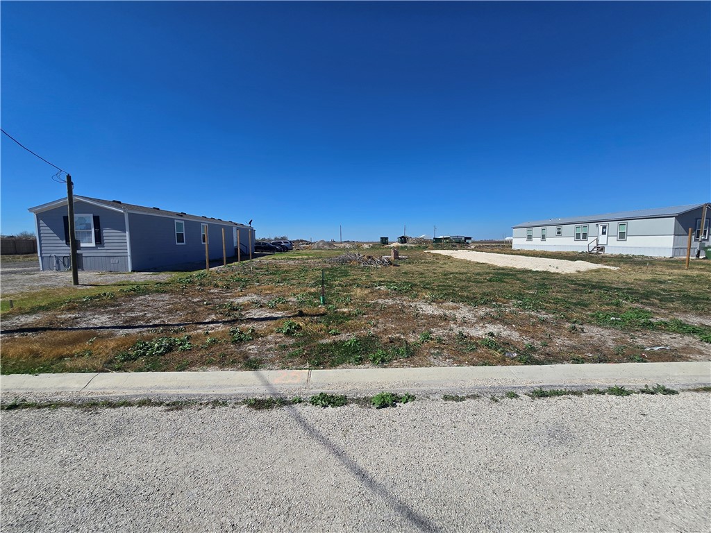 Lot 25 Packinghouse Road Taft, TX 78390 - Photo 2 of 2 a view of a yard with an ocean