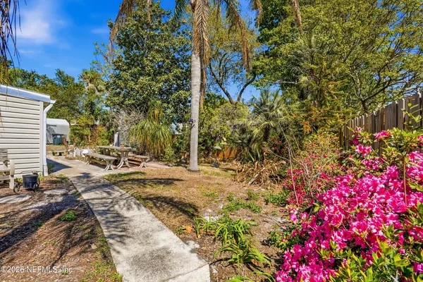 a view of entrance gate of a house