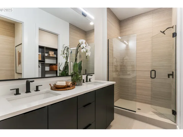 a bedroom with a bed and a table