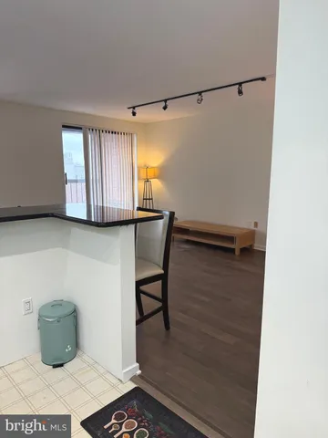 a room with a table and chairs