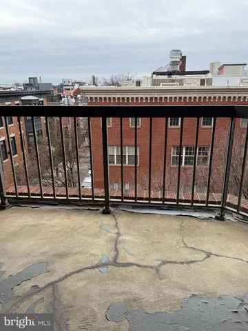 a view of a balcony with an ocean view