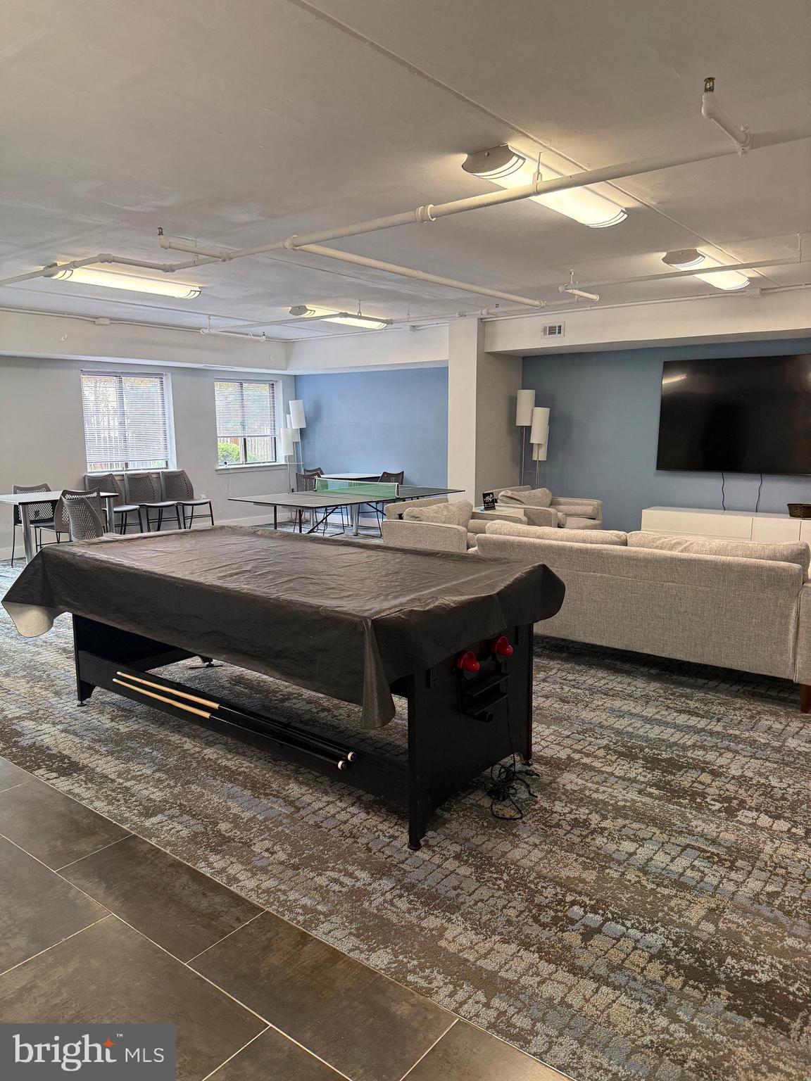 200 Lombard Street, Unit 625 Philadelphia, PA 19147 - Photo 27 of 38 a room with stainless steel appliances kitchen island granite countertop a sink and a stove