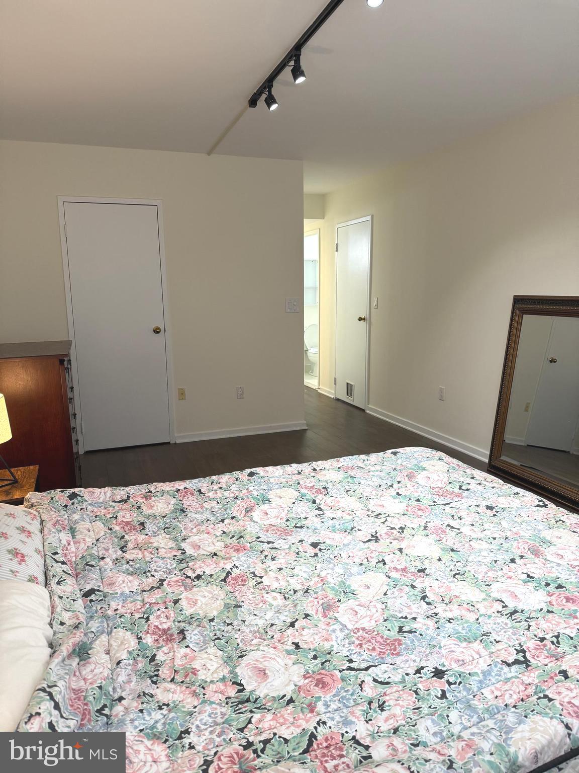 200 Lombard Street, Unit 625 Philadelphia, PA 19147 - Photo 3 of 38 a view of a bedroom with a bed and wooden floor