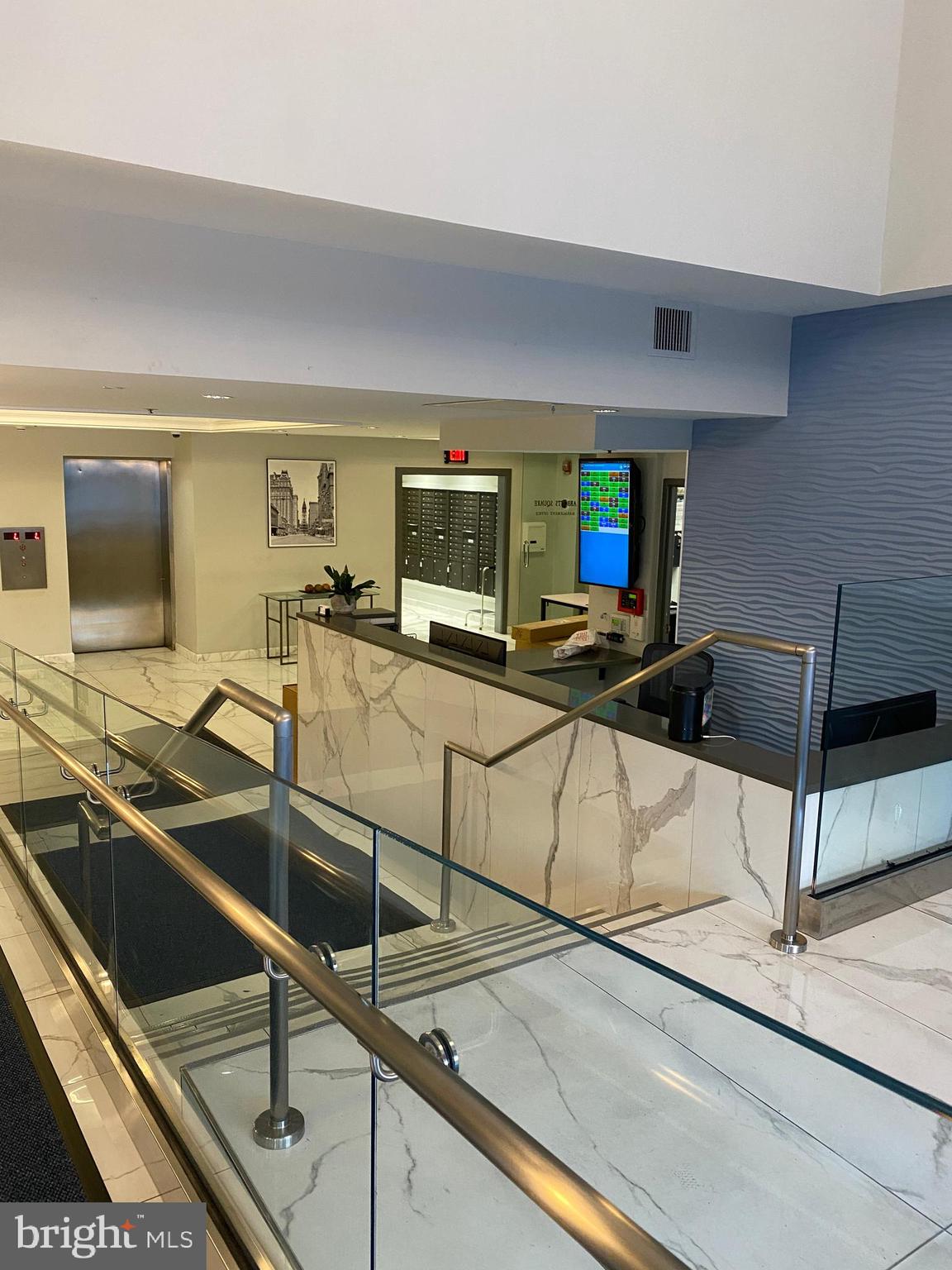 200 Lombard Street, Unit 625 Philadelphia, PA 19147 - Photo 32 of 38 a room with gym equipment and view of living room