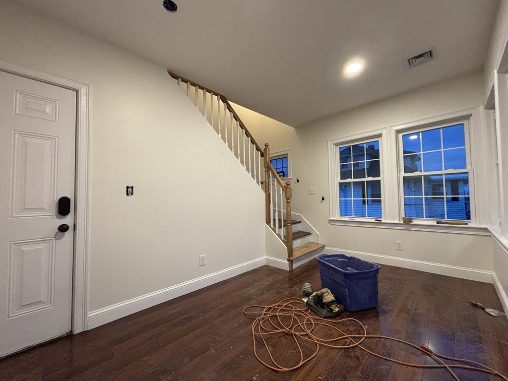 4 Appleton Street, Unit D Quincy, MA 02171 - Photo 5 of 12 a living room with furniture
