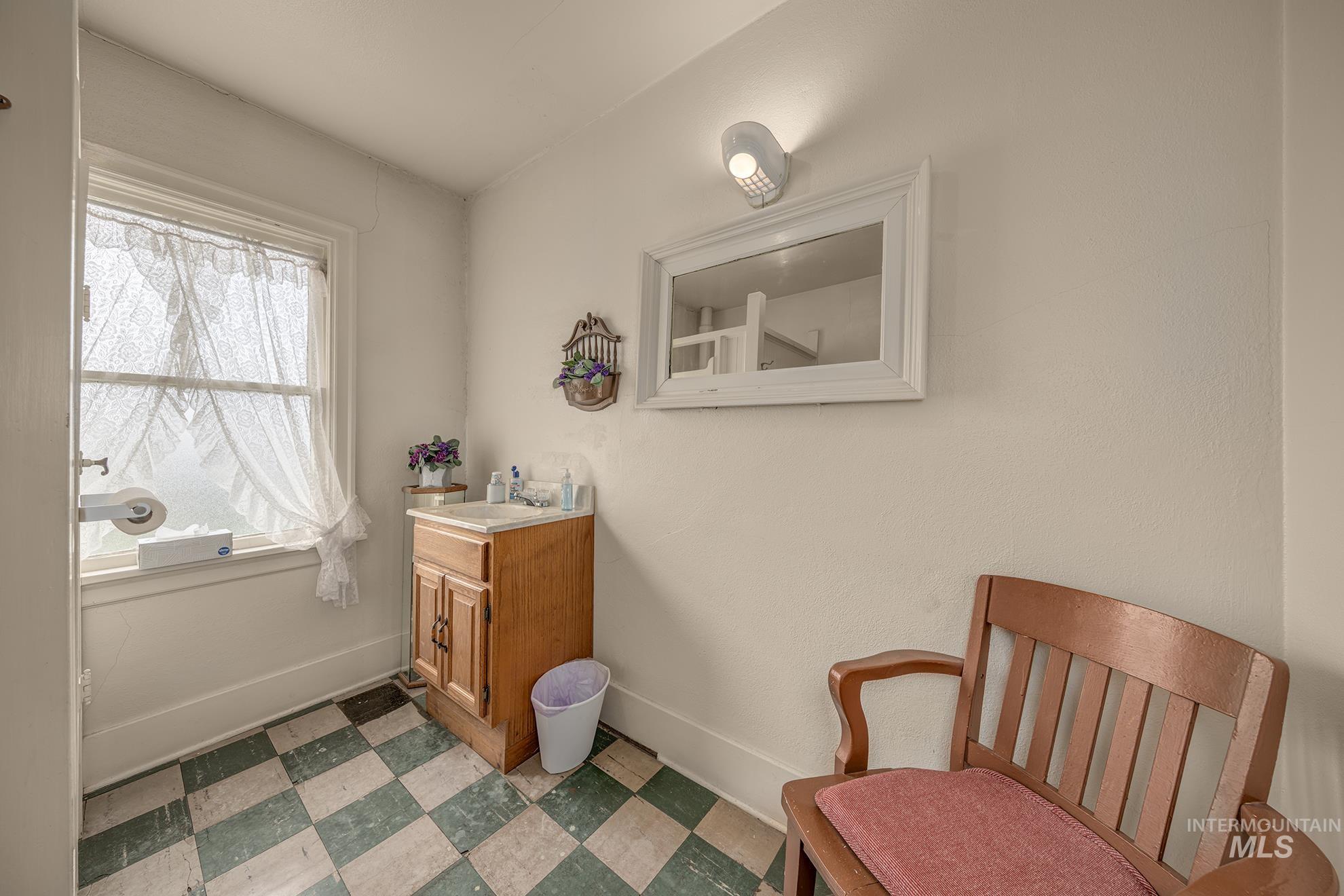 404 North 3rd Street Nyssa, OR 97913 - Photo 18 of 30 Bathroom featuring light floors and vanity