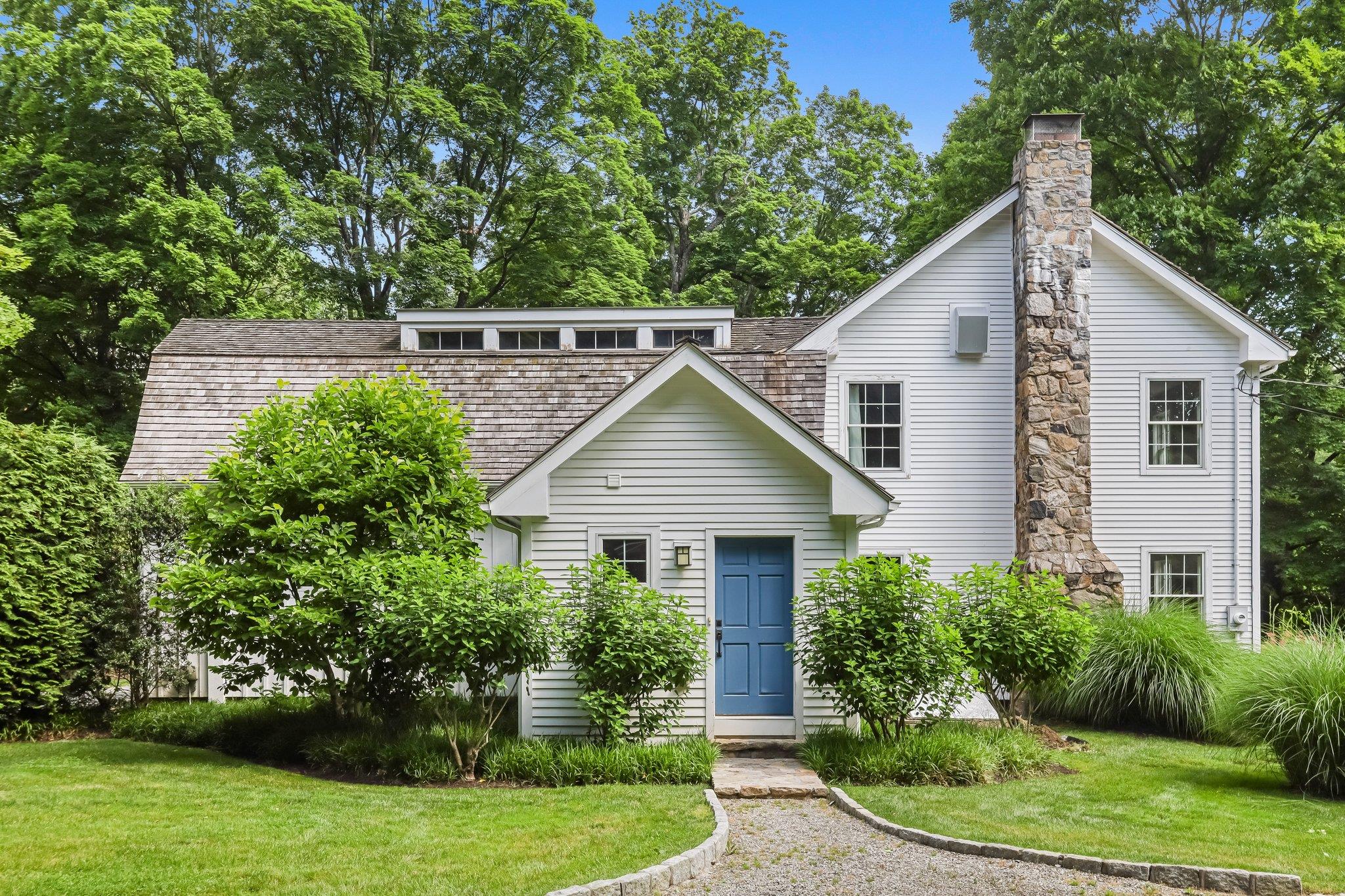 382 Long Ridge Road Pound Ridge, NY 10576 - Photo 1 of 1 a front view of house with a garden