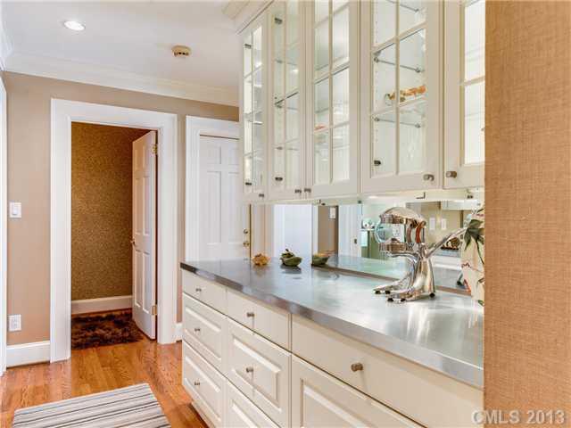 2726 Sharon Road Charlotte, NC 28211 - Photo 14 of 16 a bathroom with double vanity and a tub