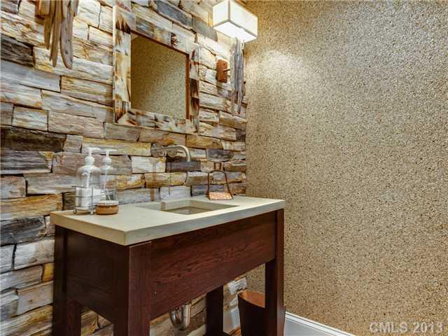 2726 Sharon Road Charlotte, NC 28211 - Photo 15 of 16 a bathroom with a sink and a mirror