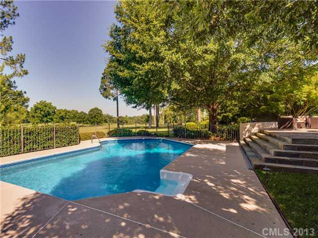 2726 Sharon Road Charlotte, NC 28211 - Photo 16 of 16 a view of a swimming pool with a patio