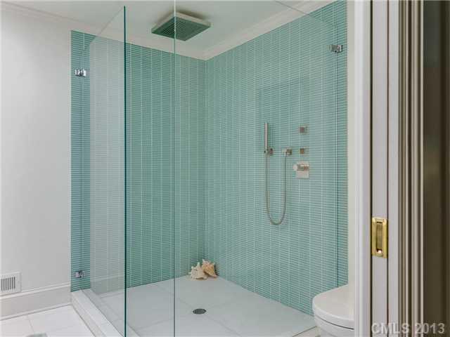 2726 Sharon Road Charlotte, NC 28211 - Photo 8 of 16 a bathroom with a toilet and shower