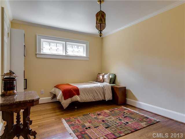 2726 Sharon Road Charlotte, NC 28211 - Photo 9 of 16 a room with furniture and wooden floor
