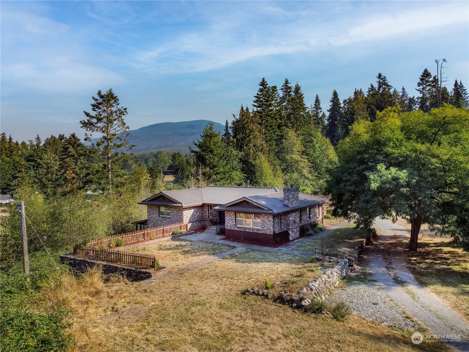 143 Senz Road Sequim, WA 98382 - Photo 3 of 40 a view of a swimming pool with a yard