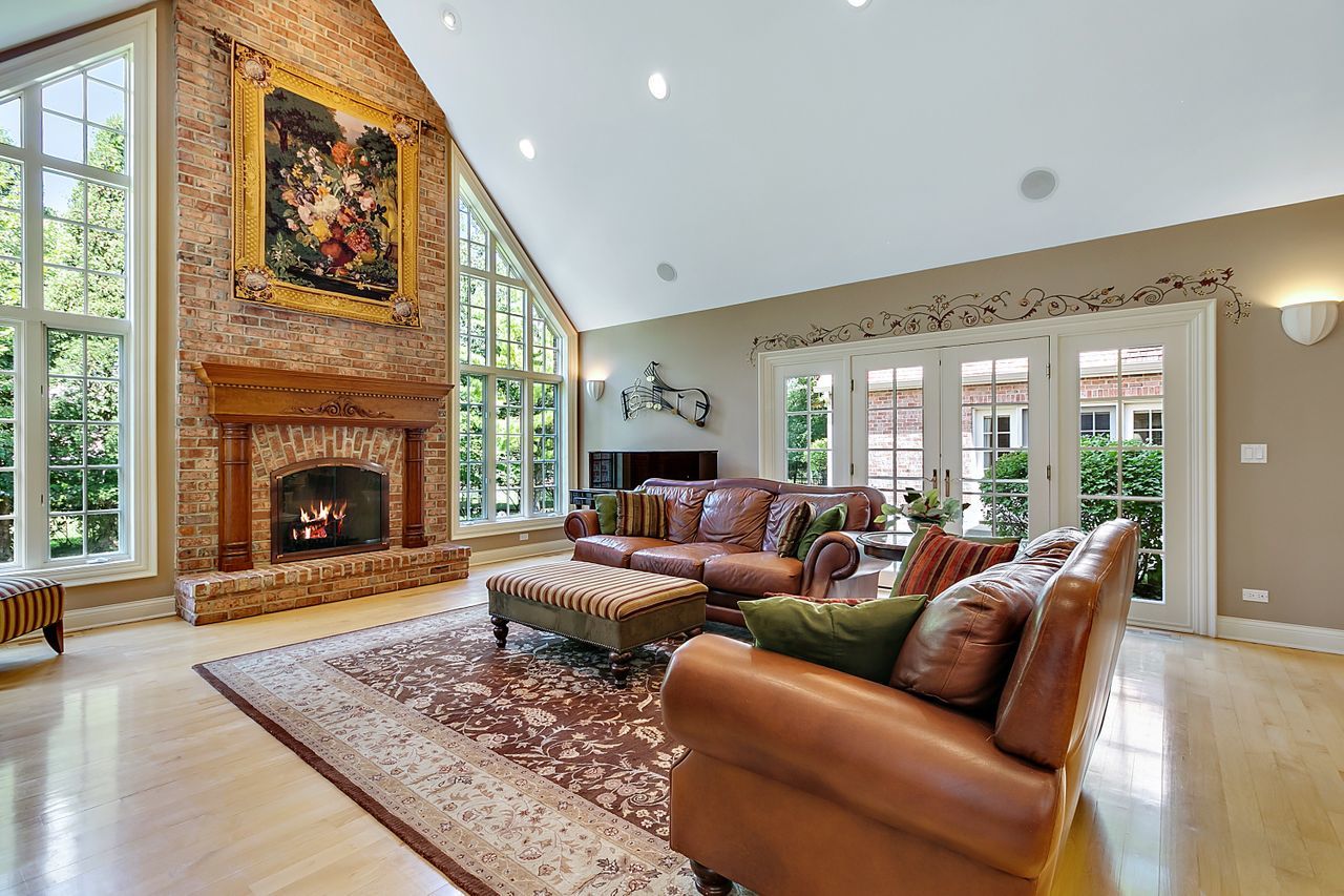 1130 Glenview Road Glenview, IL 60025 - Photo 11 of 66 a living room with furniture large window and a fireplace