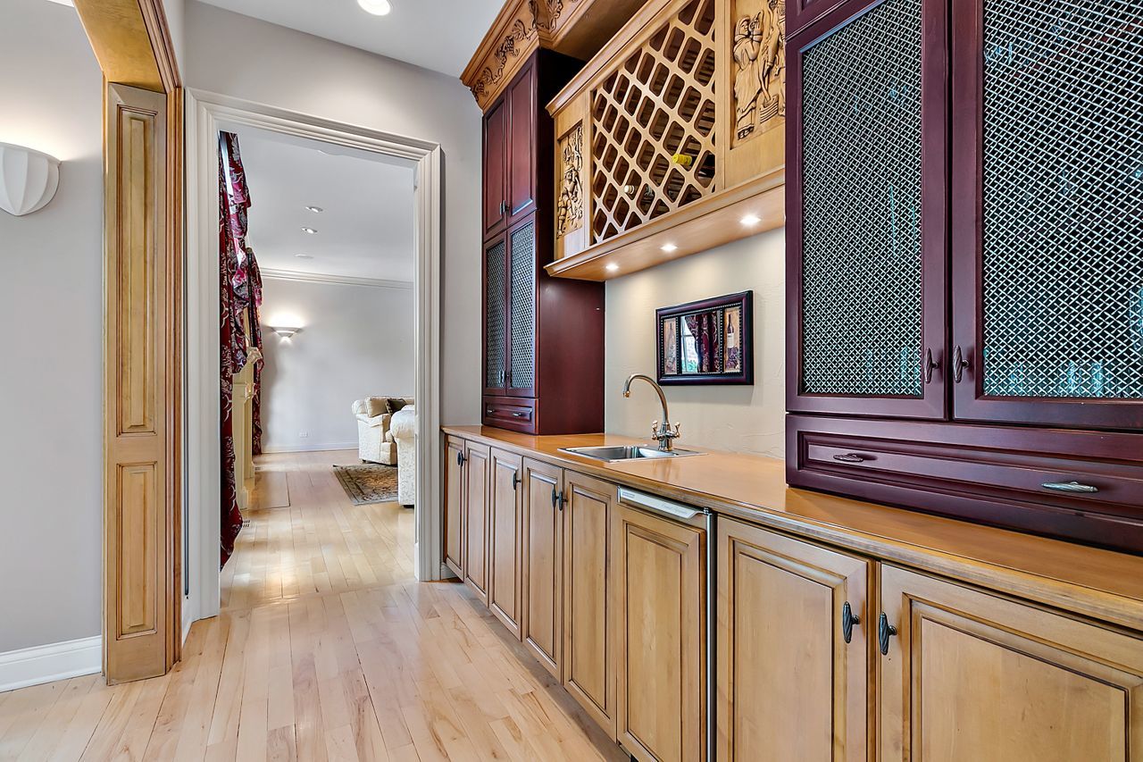 1130 Glenview Road Glenview, IL 60025 - Photo 12 of 66 a bathroom with a sink and a mirror