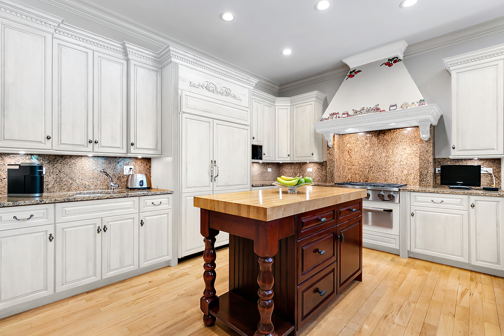 1130 Glenview Road Glenview, IL 60025 - Photo 16 of 66 a kitchen with a stove cabinets and wooden floor