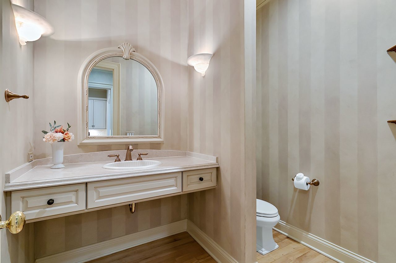 1130 Glenview Road Glenview, IL 60025 - Photo 24 of 66 a bathroom with a sink and a mirror