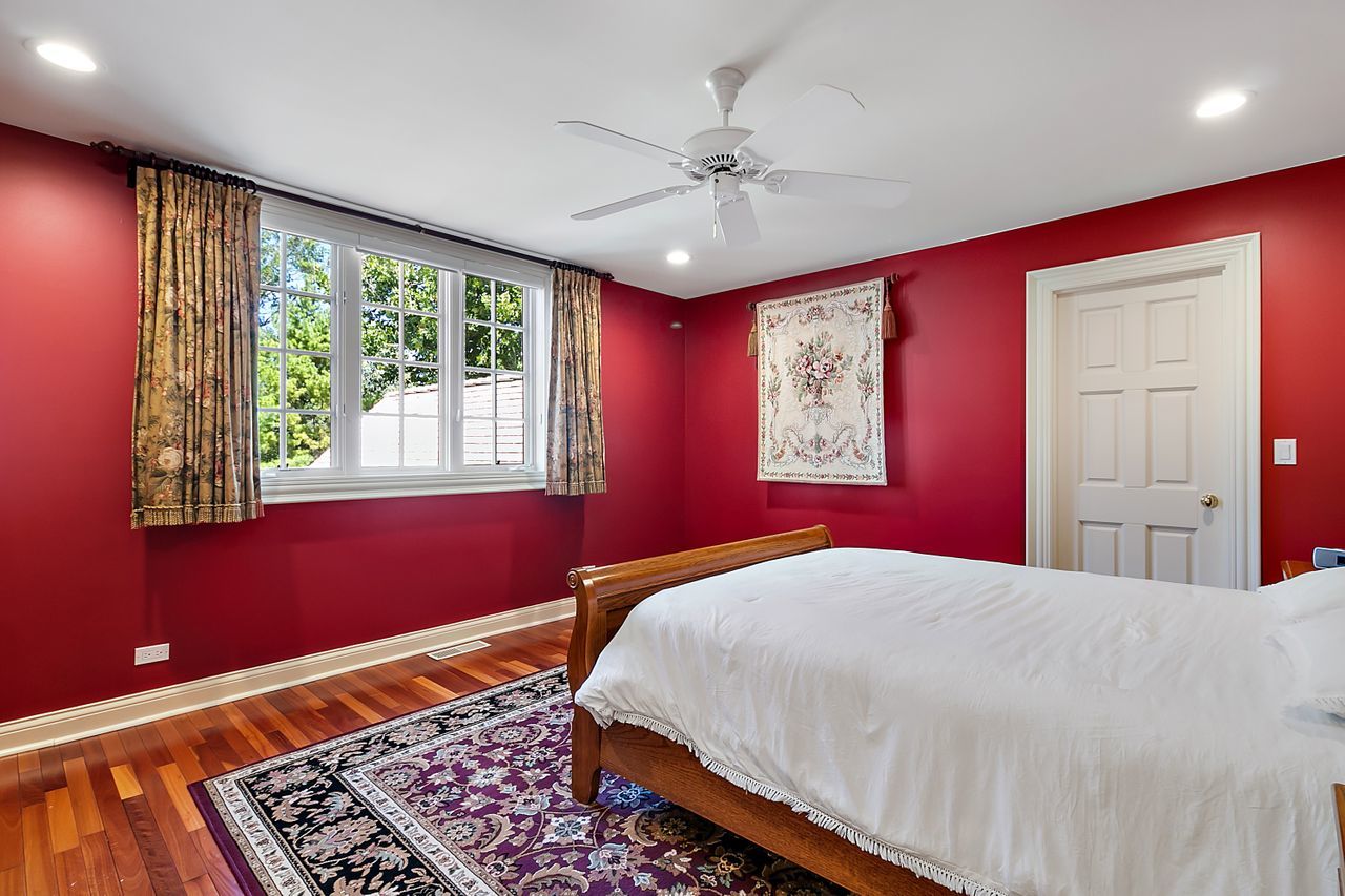 1130 Glenview Road Glenview, IL 60025 - Photo 42 of 66 a bedroom with a large bed and a window