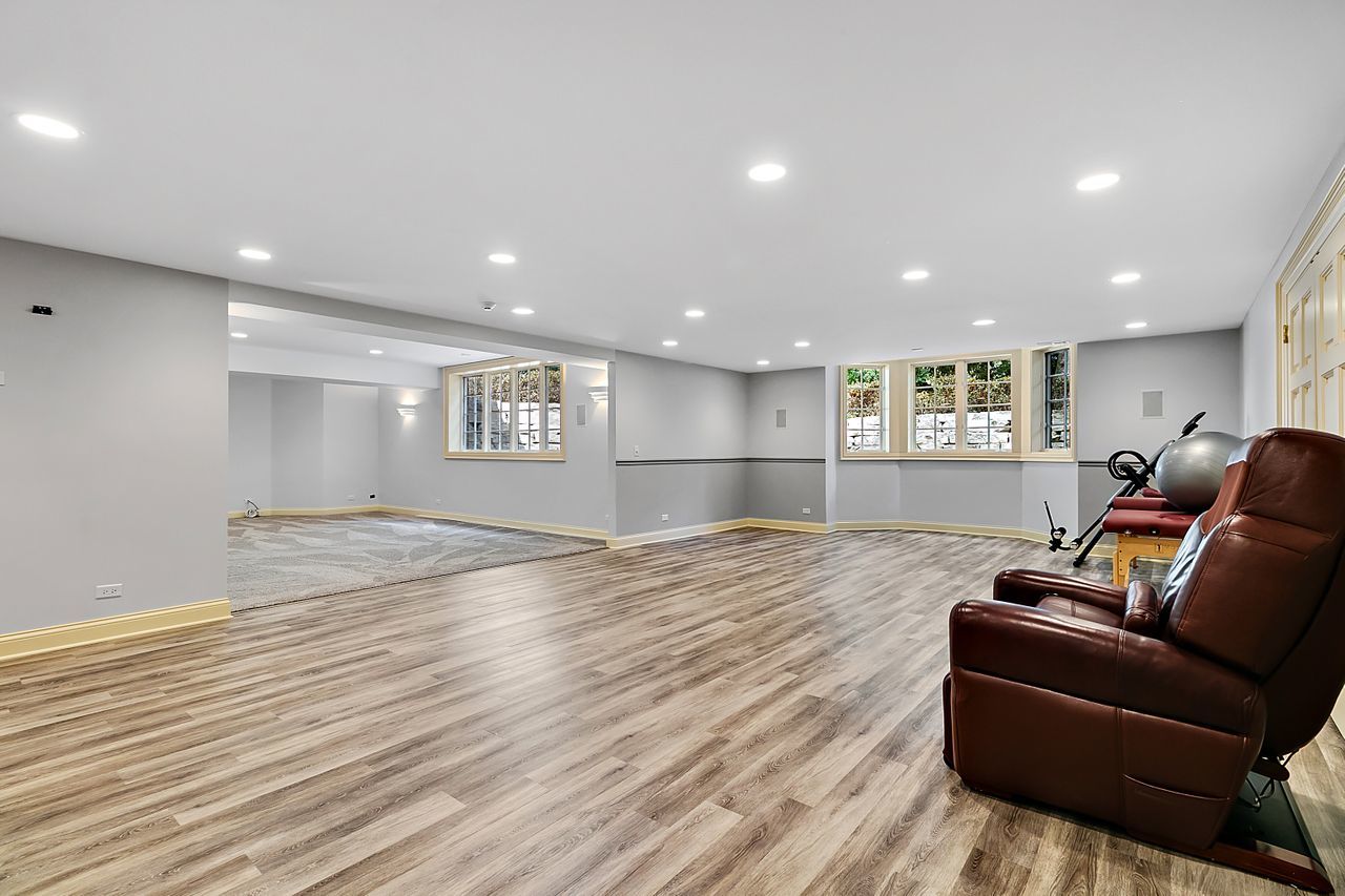 1130 Glenview Road Glenview, IL 60025 - Photo 45 of 66 a view of a livingroom with furniture and a ceiling fan