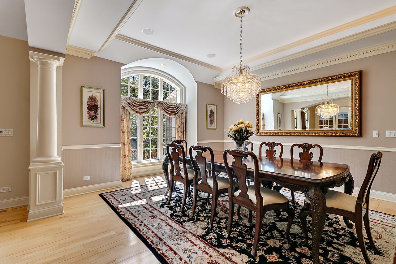1130 Glenview Road Glenview, IL 60025 - Photo 9 of 66 a view of a dining room with furniture and a chandelier