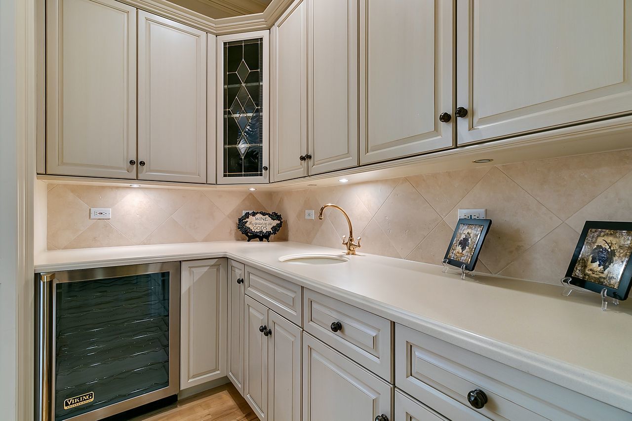 1130 Glenview Road Glenview, IL 60025 - Photo 10 of 66 a kitchen with a sink and cabinets