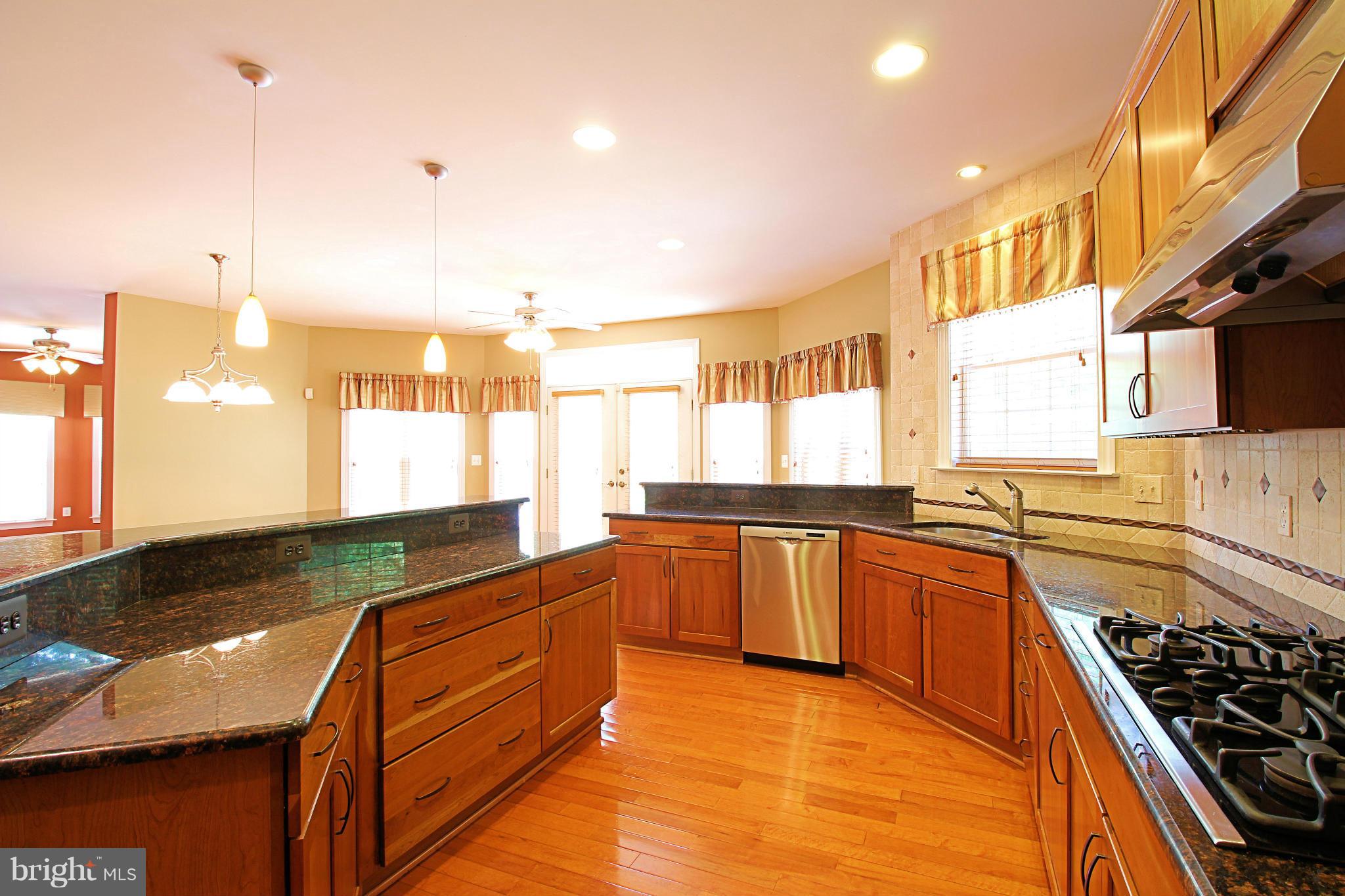 68 Willow Ridge Court Fredericksburg, VA 22406 - Photo 12 of 30 a kitchen with stainless steel appliances granite countertop a stove and a sink