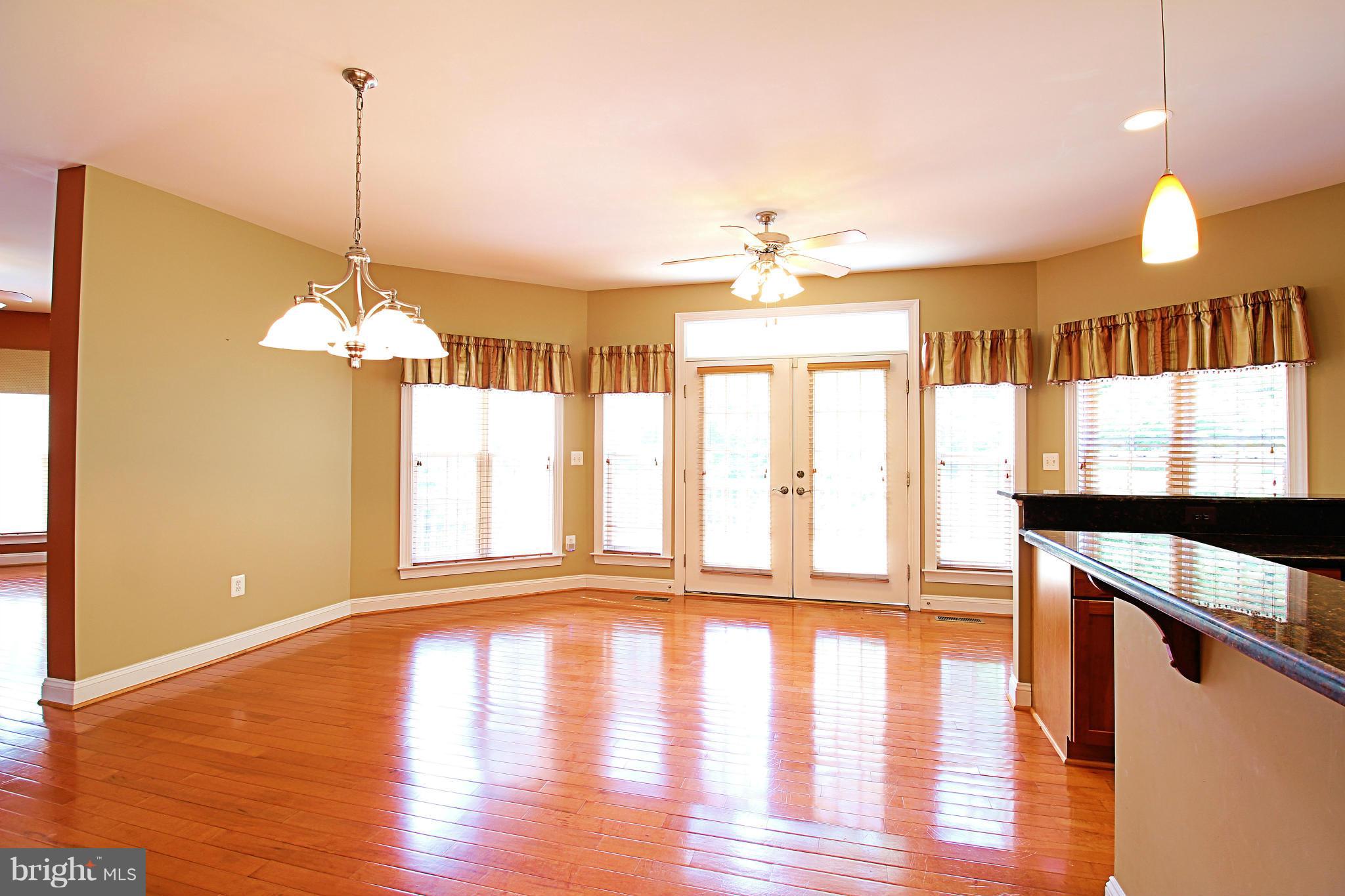 68 Willow Ridge Court Fredericksburg, VA 22406 - Photo 13 of 30 a view of a room with wooden floor and windows